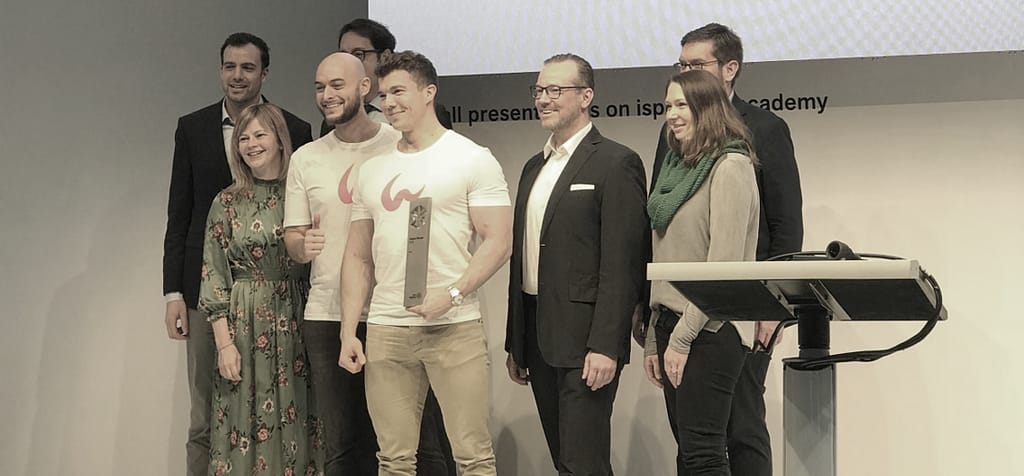 Team group photo with Dr. Thomas K. Hamann at the presentation event for the ISPO Brandnew Award 2018, Category Digital winner.