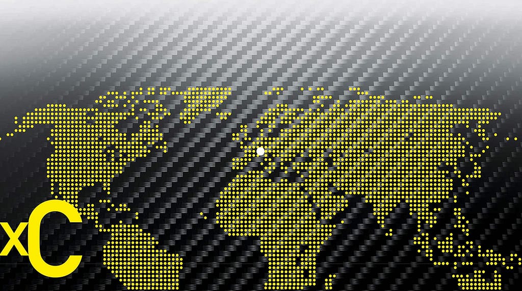Yellow dotted world map on dark tech background for xC Consultants news.