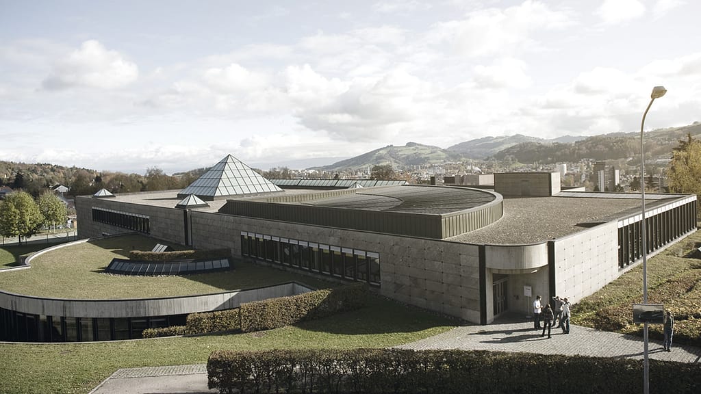 University of St. Gallen, Switzerland, with a landscaped entrance and a glass skylight.