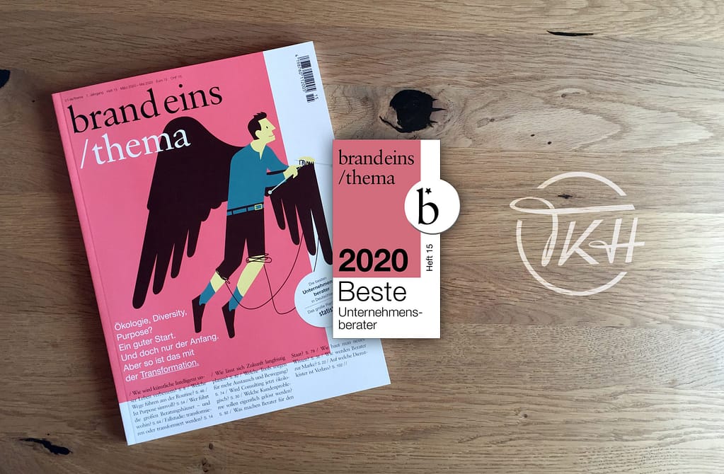 brand eins thema magazine announcing Best Consultants Germany 2020 on wooden table.