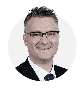 Team_WolfgangAmann_Headshot Wolfgang Amann professional corporate headshot portrait.