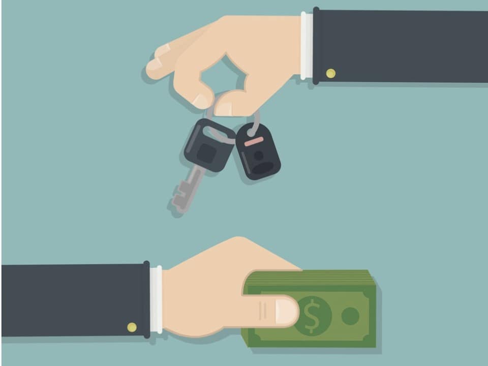 Business handover of car keys for cash in car sale.